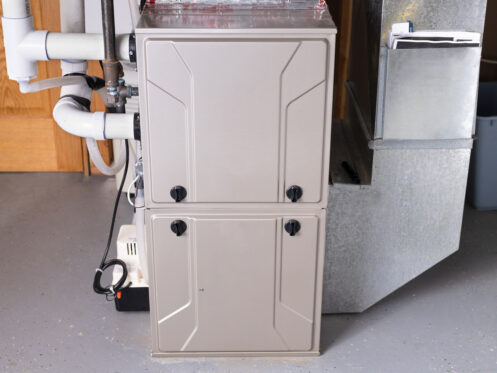 Double stage gas furnace in the basement of a Sterling home